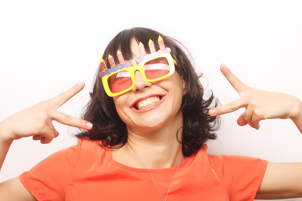 young happy woman with big orange sunglasses - Foto, Bild