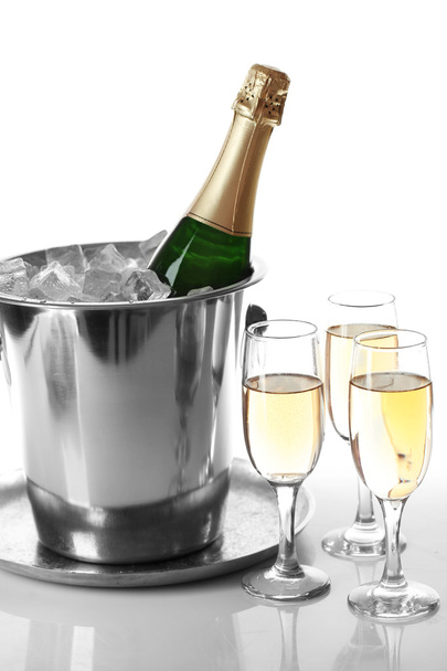 Glasses of champagne on bright background - Fotografie, Obrázek