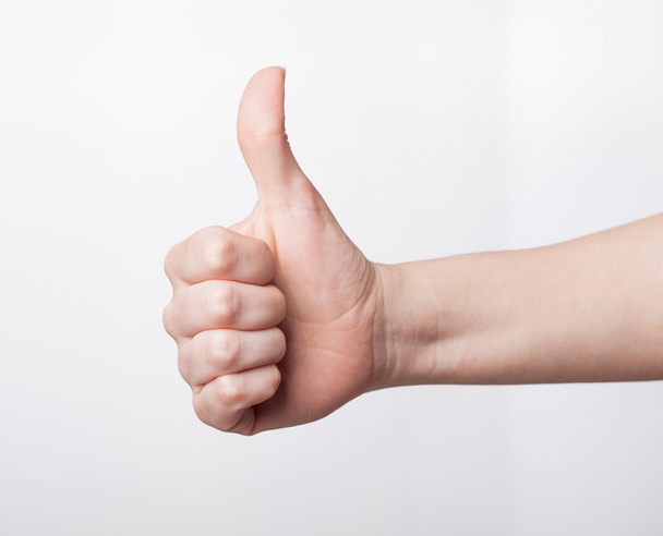 Approval thumbs up like sign as  hand gesture isolated over whit - Photo, Image