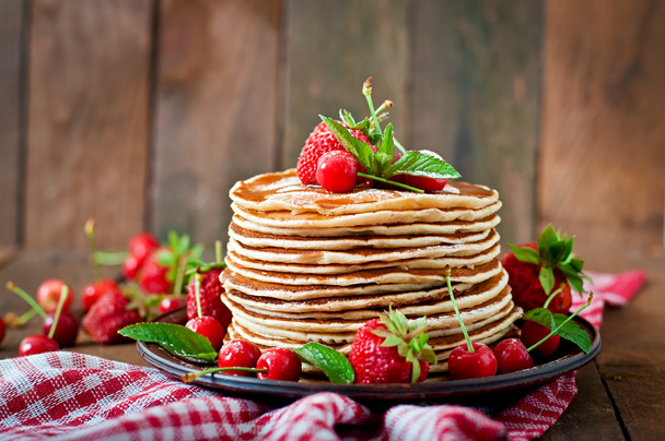 Pancakes with berries and syrup - Photo, Image