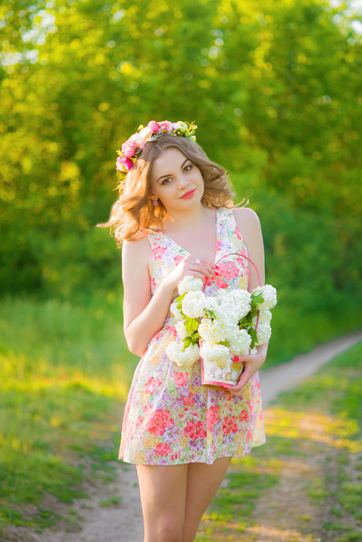 beautiful girl with flowers in  summer - Foto, Imagem