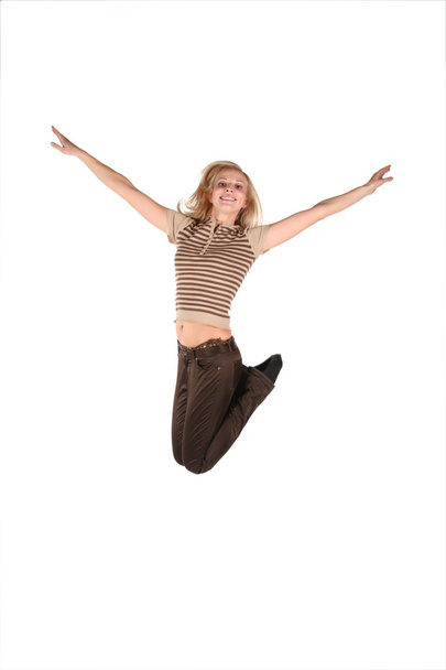 Beautiful young woman jump isolated on white - Фото, зображення