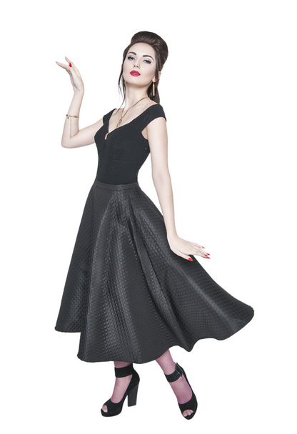 Young beautiful woman in retro pin-up style with fluttering dres - Foto, imagen