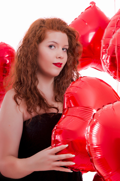 happy young girl between red balloons - Fotoğraf, Görsel