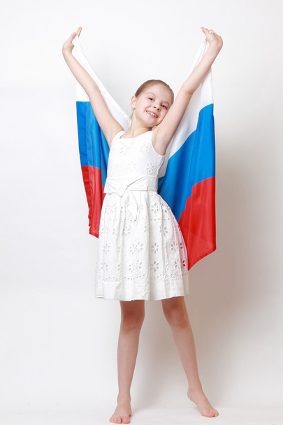 Kid holding symbolic flag - Foto, Imagem