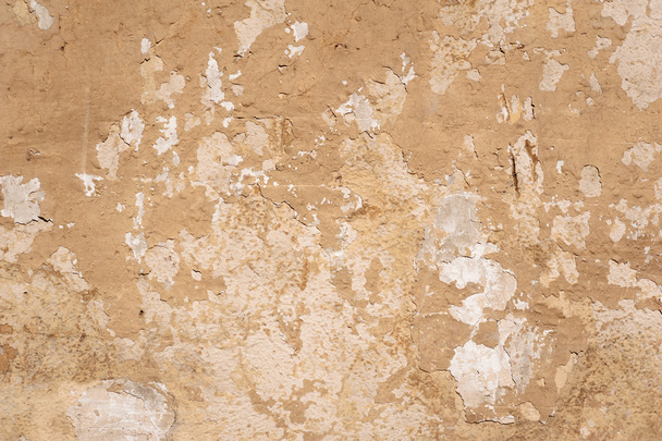 Texture of old wall covered with brown stucco - Fotó, kép