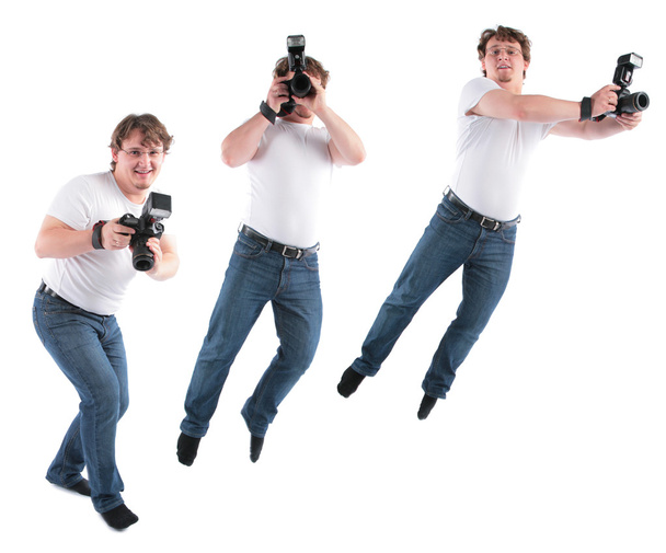 Young man goes with camera - Φωτογραφία, εικόνα