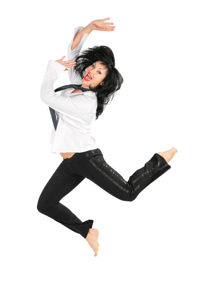 Jumping barefoot brunette - Фото, изображение
