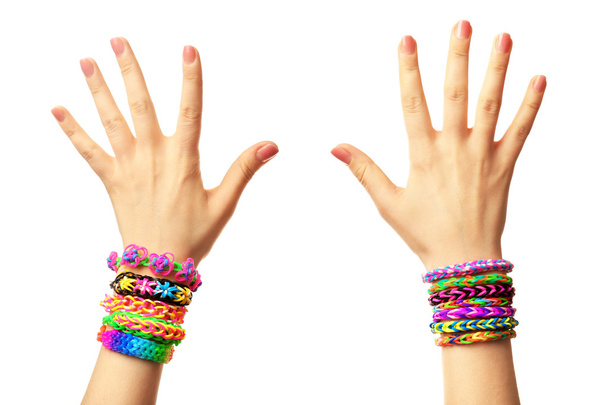 Female hands with bracelets isolated on white - Fotografie, Obrázek