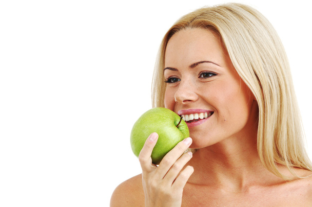 Woman eat green apple - Valokuva, kuva