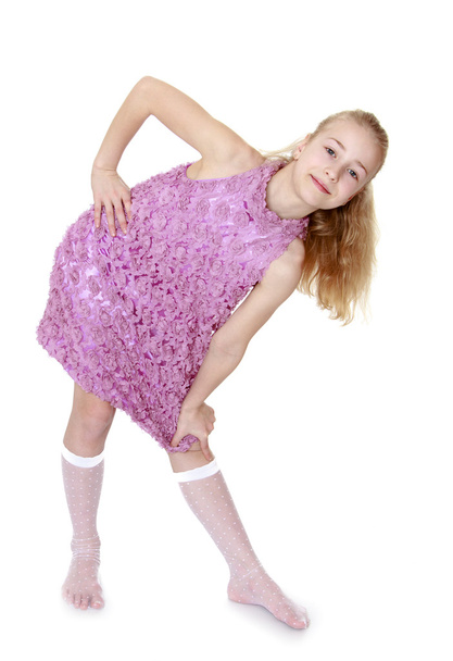 Caucasian fashionable girl in a beautiful dress and socks - Photo, image
