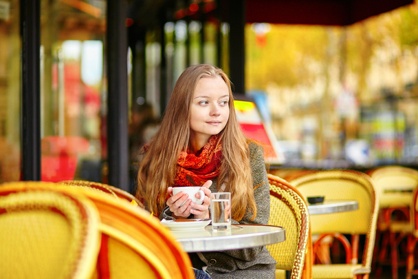 Young girl in Paris on a fall day - Фото, изображение