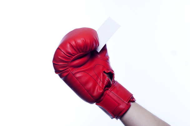 Boxing gloves holding empty business blank - Zdjęcie, obraz