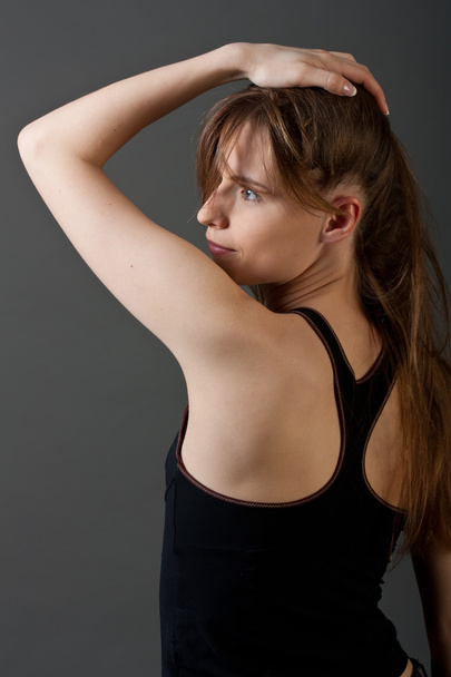 Young fitness woman from back - 写真・画像
