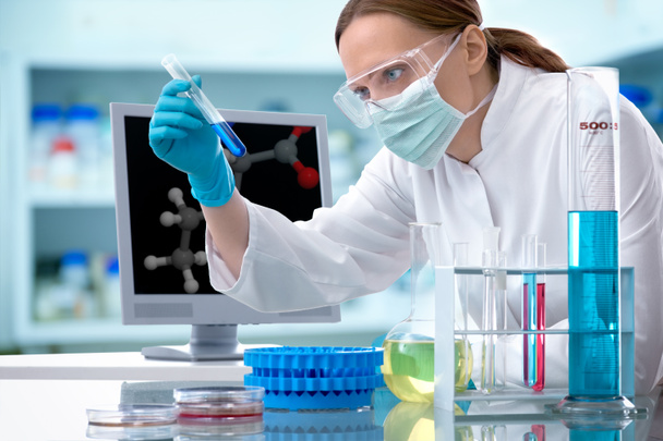 Scientist working at the laboratory - Фото, изображение