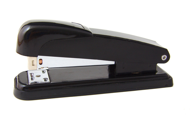 Черный профессиональный степлер изолирован на белом фоне
 - Фото, изображение