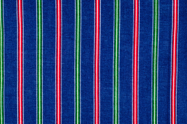 Batiste stof textuur. Gestreepte kleuren, rood groen blauw wit s - Foto, afbeelding