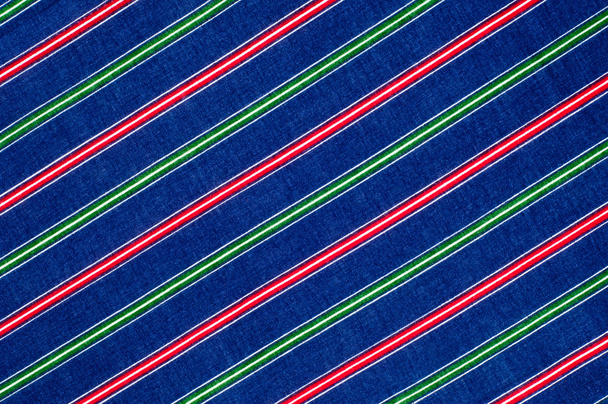 Batiste fabric texture. striped coloring, red green blue white stripes - Photo, Image