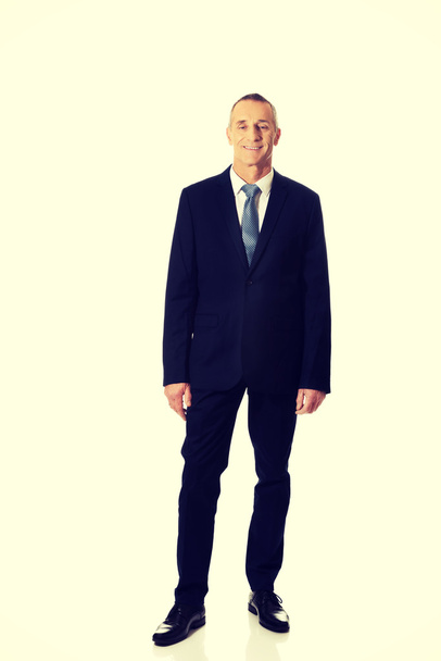 Confident businessman standing - Foto, immagini