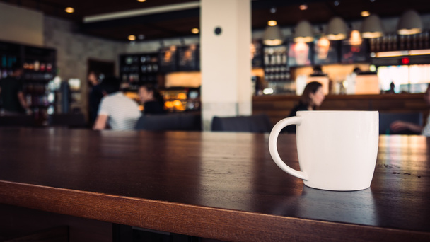 чашка кави в магазині
 - Фото, зображення