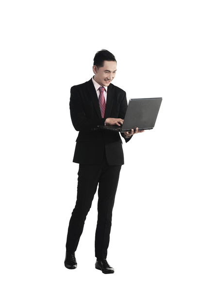 Asian Business Man Holding Laptop - Foto, afbeelding