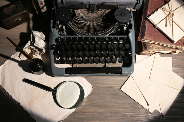 Retro typewriter on wooden table, closeup - Foto, Imagen