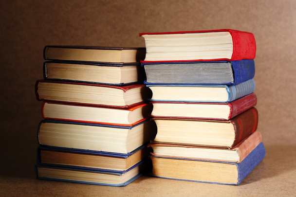 Old books on shelf, close-up, on wooden background - Фото, зображення