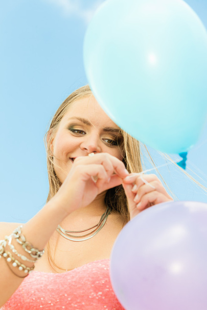 teen girl with colorful balloons - Фото, зображення