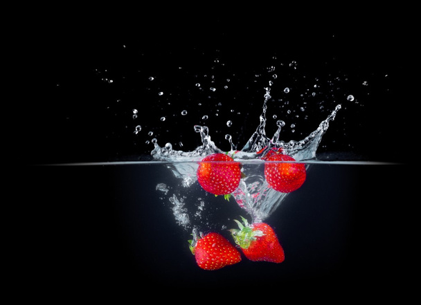 Fruit Splashing into wate - Фото, зображення