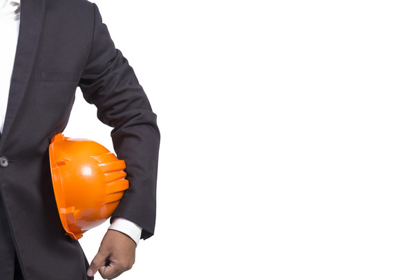 ingenieur oranje helm voor werknemers zekerheid witte achtergrond - Foto, afbeelding