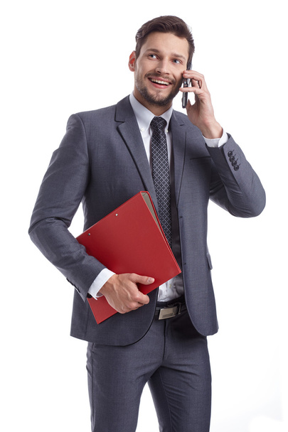 businessman with phone and folders - Fotoğraf, Görsel