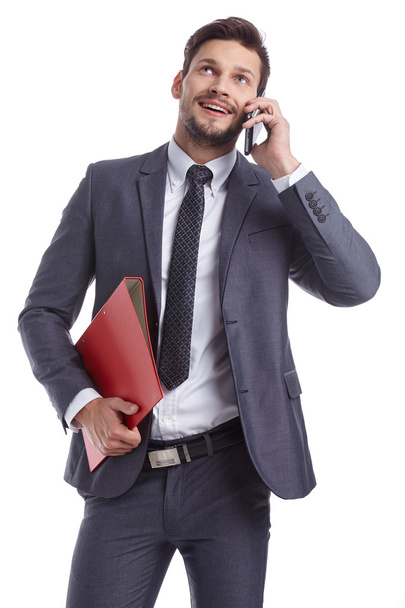 businessman with phone and folders - Фото, зображення