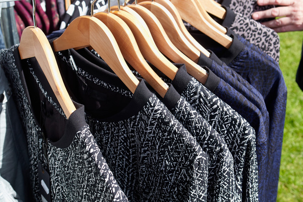 Fashionable blouses on hanger rack display - Photo, Image