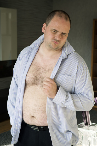 man with open shirt flirts with the camera - Фото, зображення