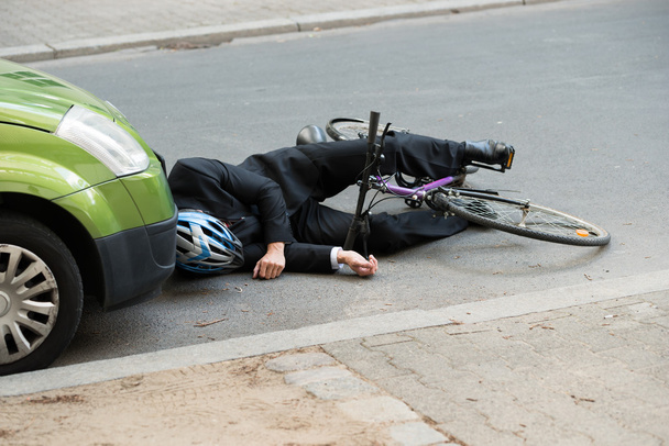 Cyclist After road Accident - Фото, изображение