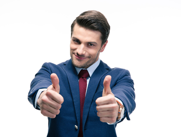 Businessman showing thumbs up sign - Foto, Imagen