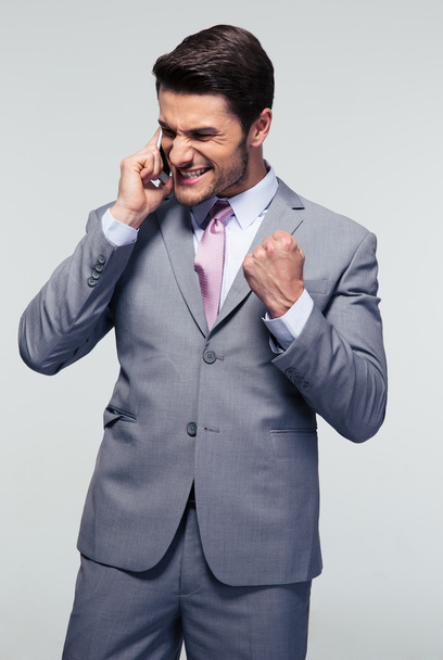 Happy businessman talking on the phone - Fotografie, Obrázek