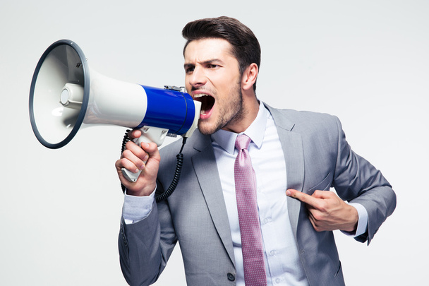 Businessman shouting in loudspeaker - Фото, зображення