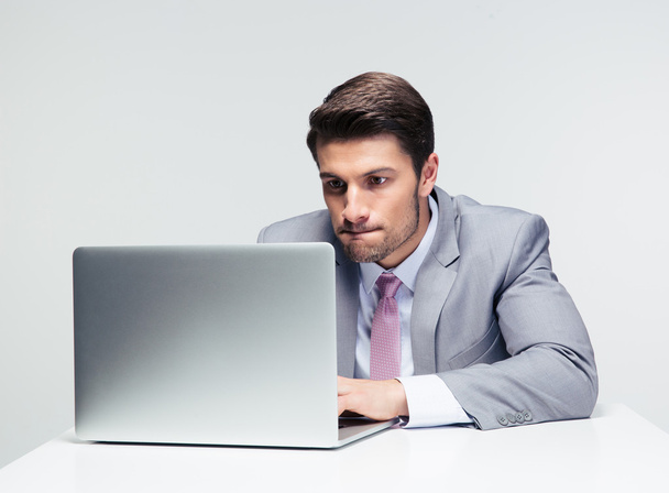 Businessman working on the laptop  - Фото, зображення