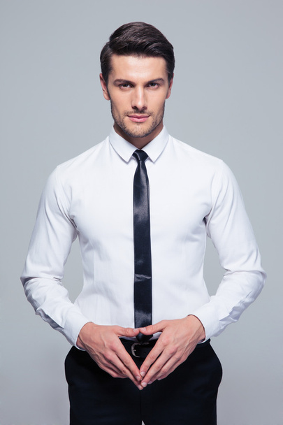 Handsome businessman looking at camera - Photo, Image