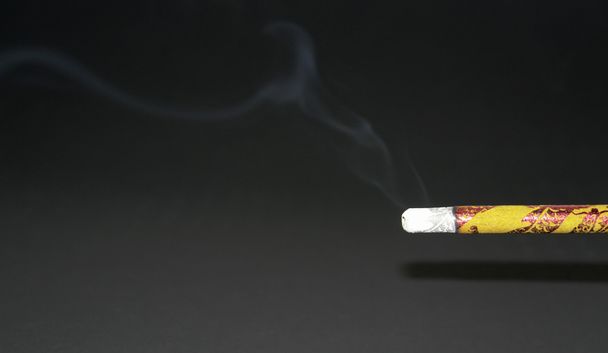 dohányzás bálvány bot - Fotó, kép