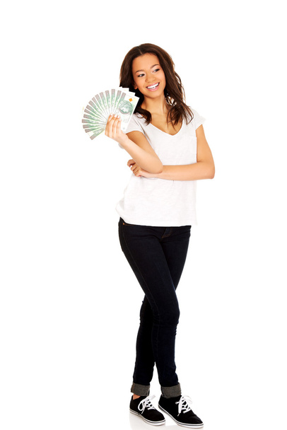 African woman holding polish money. - Foto, Imagem