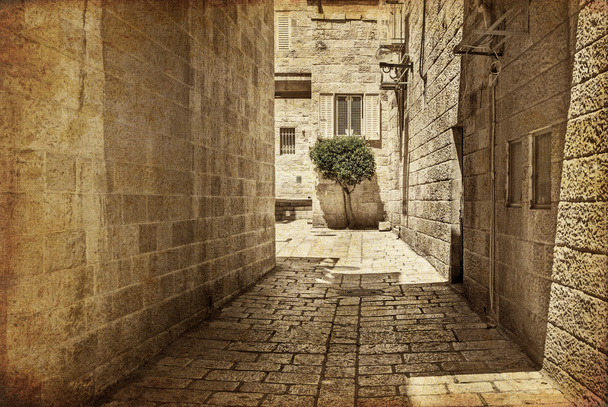 Стародавні алеї в єврейському кварталі, Єрусалим. Фото в старий стиль кольору зображення. - Фото, зображення