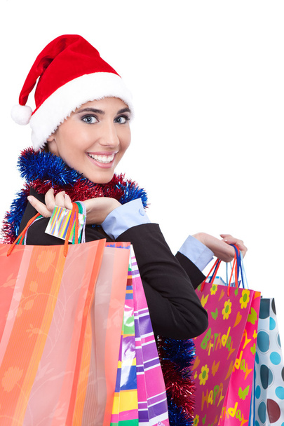 Santa girl with shopping bags - Фото, зображення