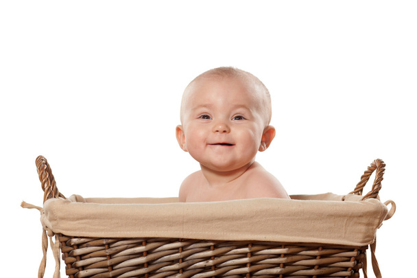 Bebê em uma toalha
 - Foto, Imagem