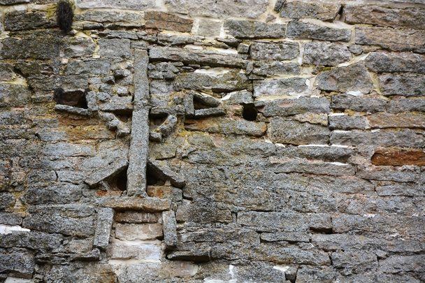 Cross on the wall of the Izborsk fortress - Photo, Image