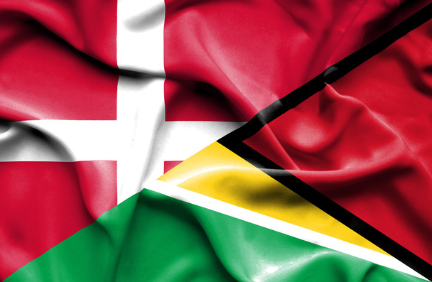 Waving flag of Guyana and Denmark - Photo, Image