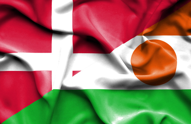 Waving flag of Niger and Denmark - Foto, imagen