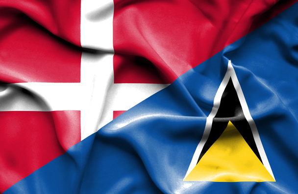 Waving flag of St Lucia and Denmark - Photo, Image