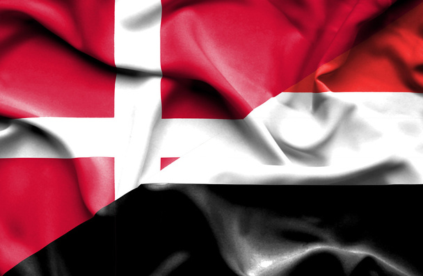 Waving flag of Yemen and Denmark - Foto, Imagen